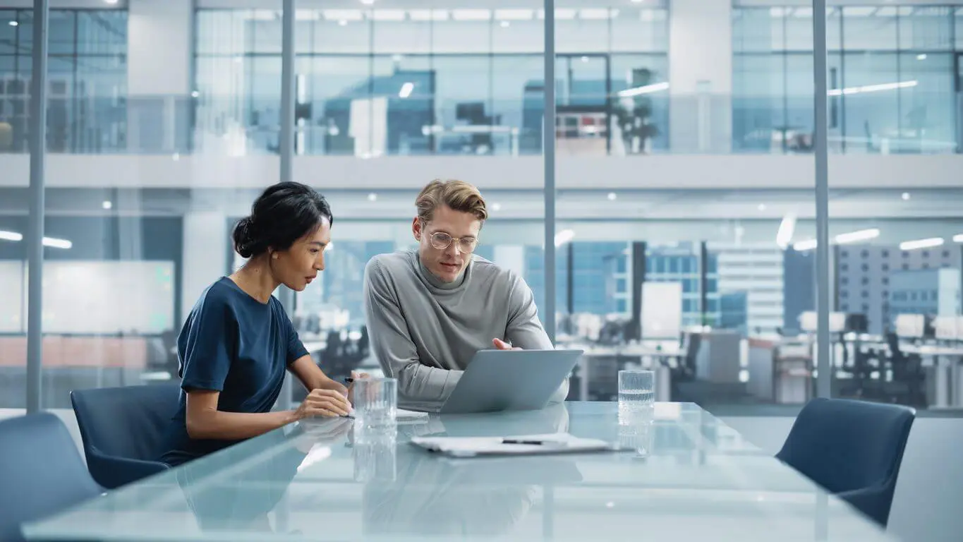 Young Businesspeople on a Meeting in a Modern NYC Science Lab’s Glass office.