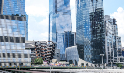 Manhattan's tall and sleek skyscrapers, a building featuring a distinctive honeycomb-like facade