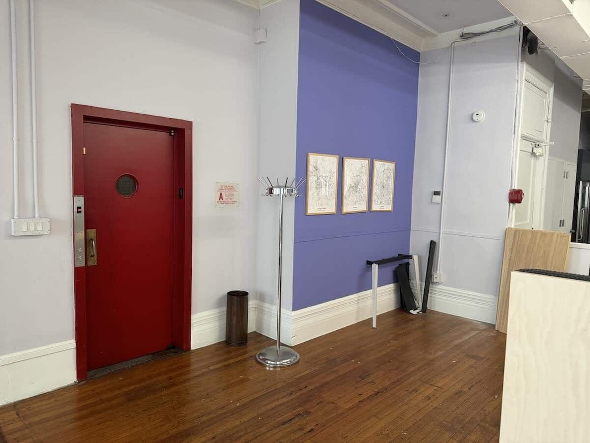 Located at 29 East 19th Street, entire 4th floor features a red door.