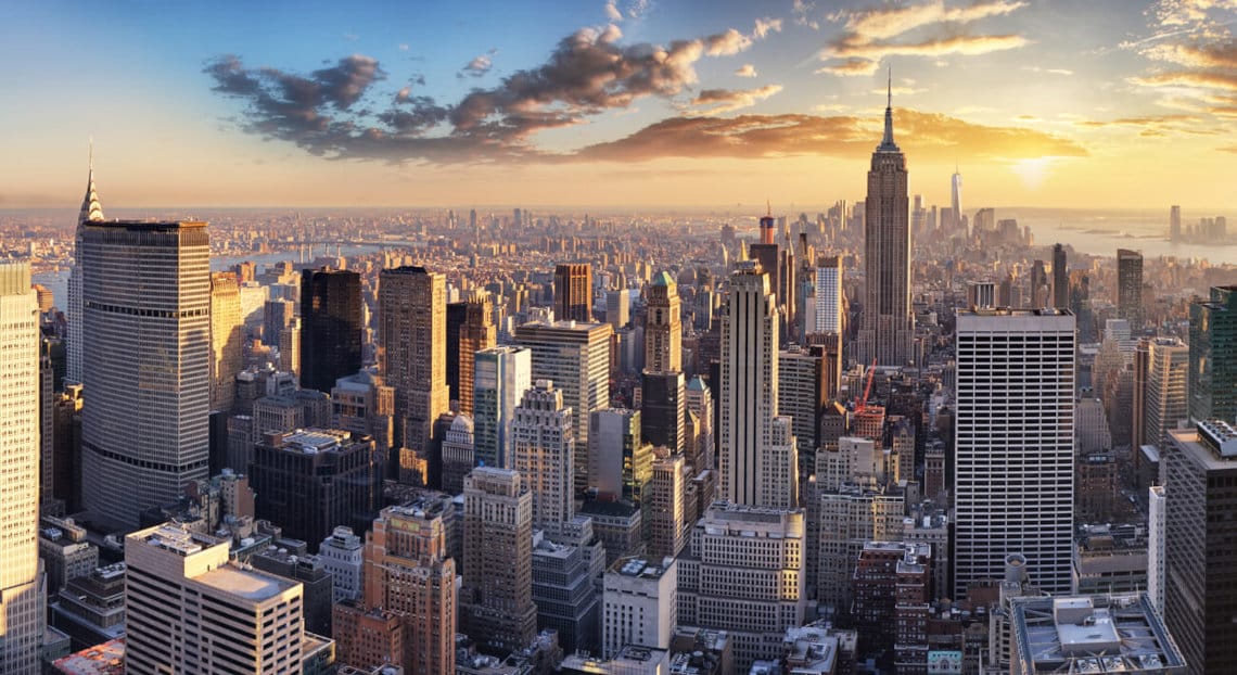 An aerial view of NYC, showcasing the city's impressive skyline and its historic buildings.