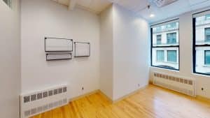 Office: #405, 928 Broadway - Bright, empty room with white walls